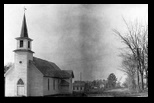 Grace Luthern Church in Augusta Wisconsin. edited picture version circa 1930s Not the Bible School in th ebackground and the unpaved roads and young trees